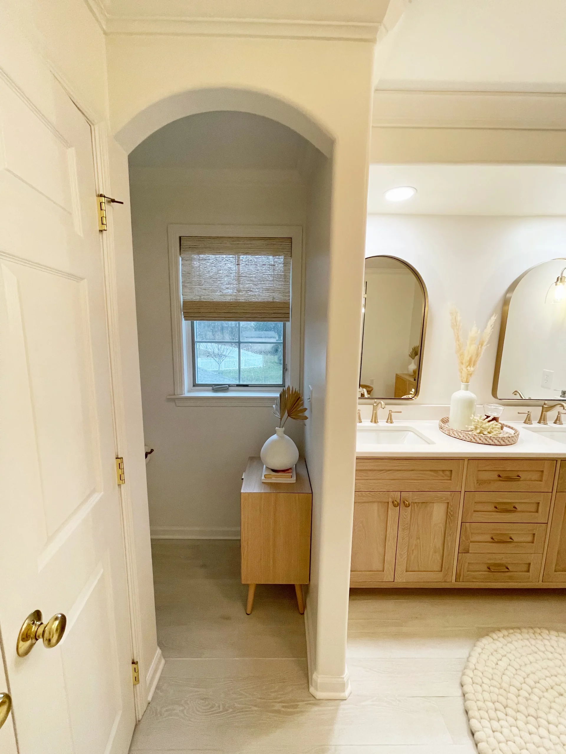 master bath meadowcross - double sinks, pampas grass, rounded mirrors