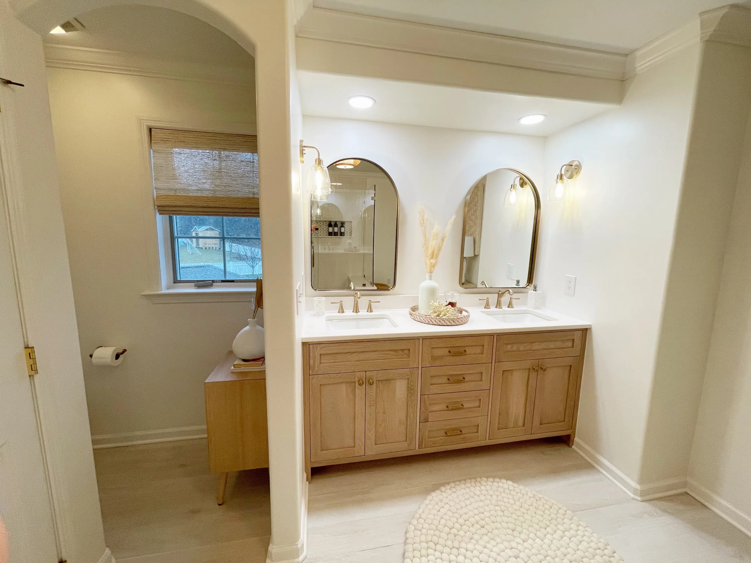 master bath meadowcross - double sinks, pampas grass, rounded mirrors