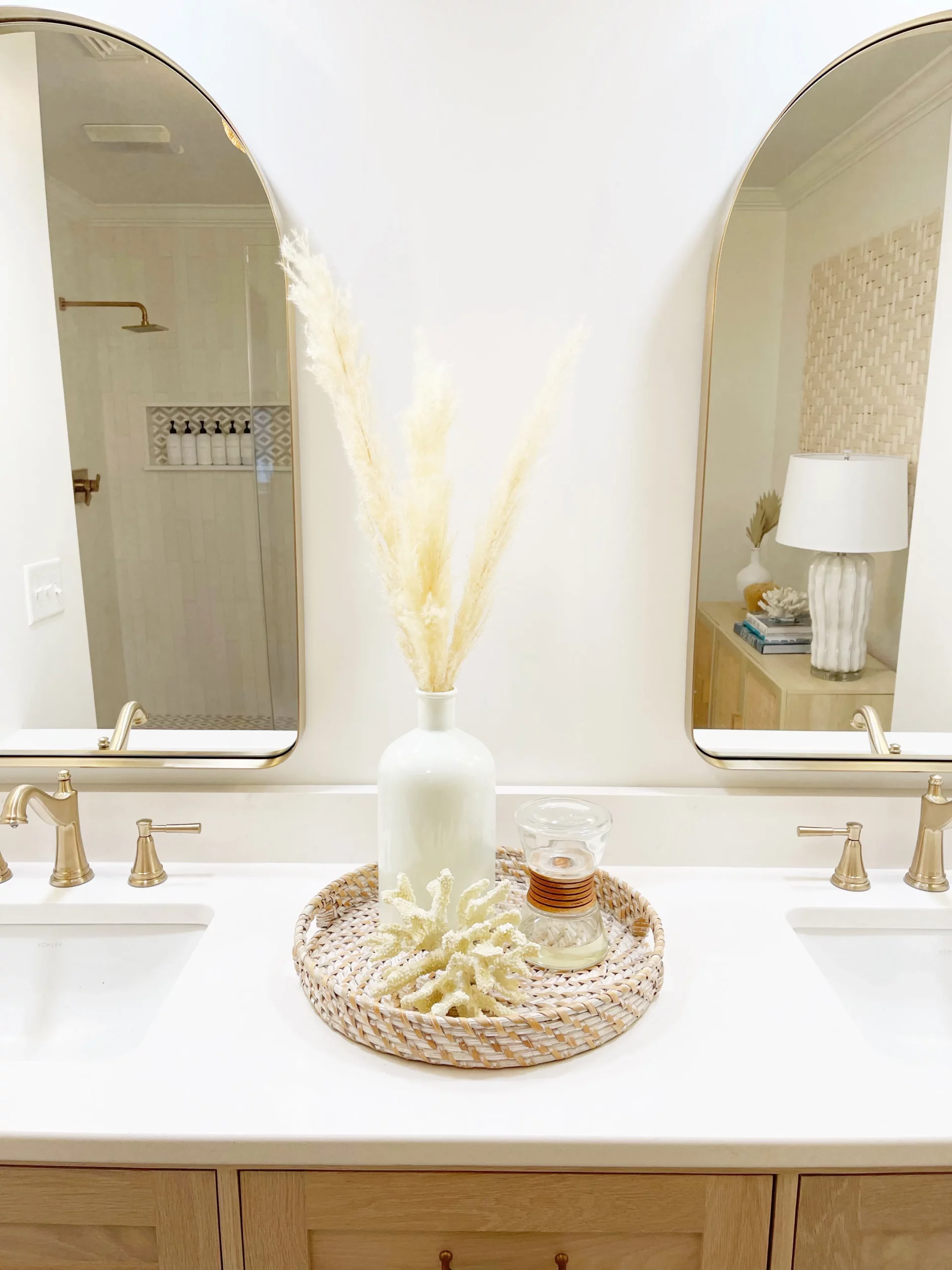 master bath meadowcross - double sinks, pampas grass, rounded mirrors